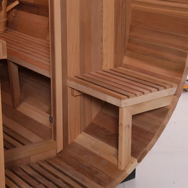 A closeup of the seating exterior of a 6-person cedar traditional steam barrel sauna.