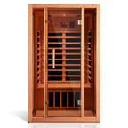 Wooden sauna with glass doors on a white background.