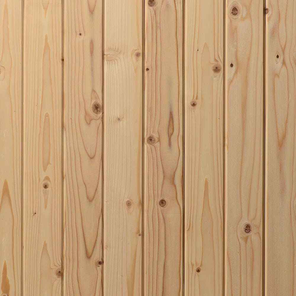 Close-up of a wooden panel with visible grain and knots.