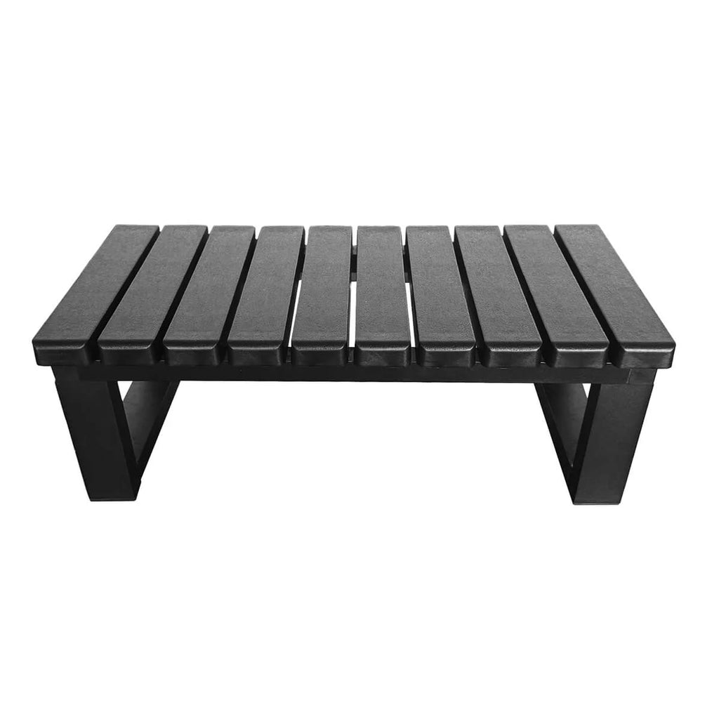 Black outdoor bench with slatted design on a white background.