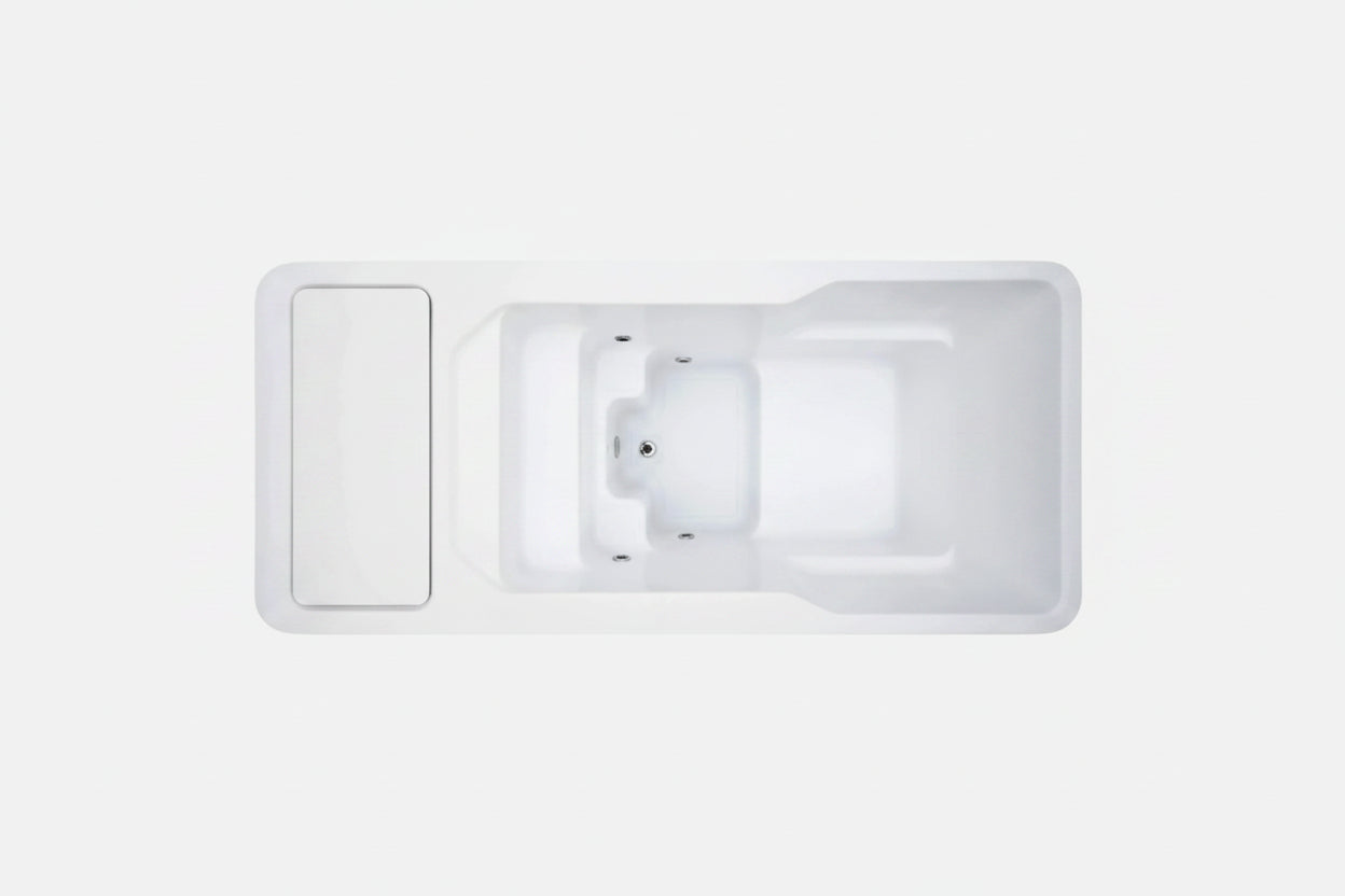 White hot and cold plunge with a control panel on a light gray background.