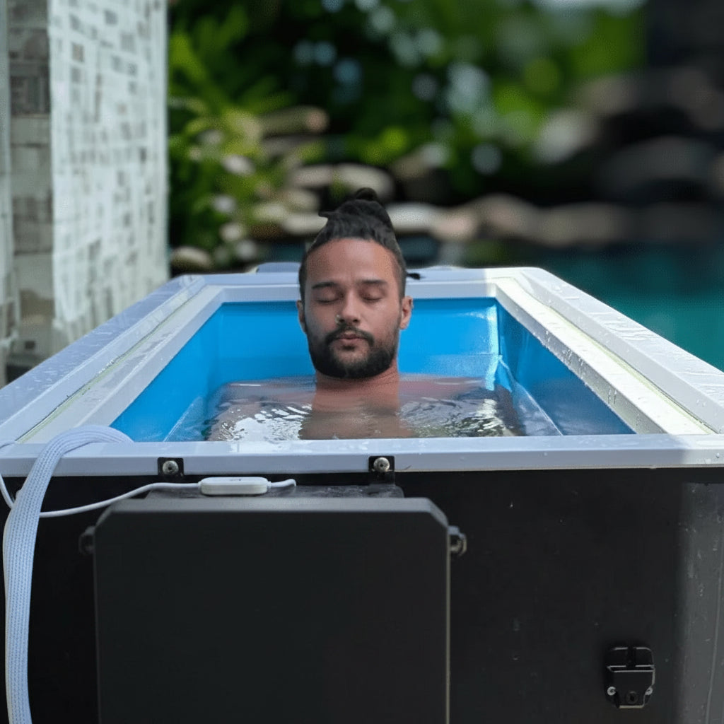 Person in a cold water immersion chamber.