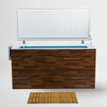 A wooden cold plunge with a lid, featuring a wooden mat on a white background.