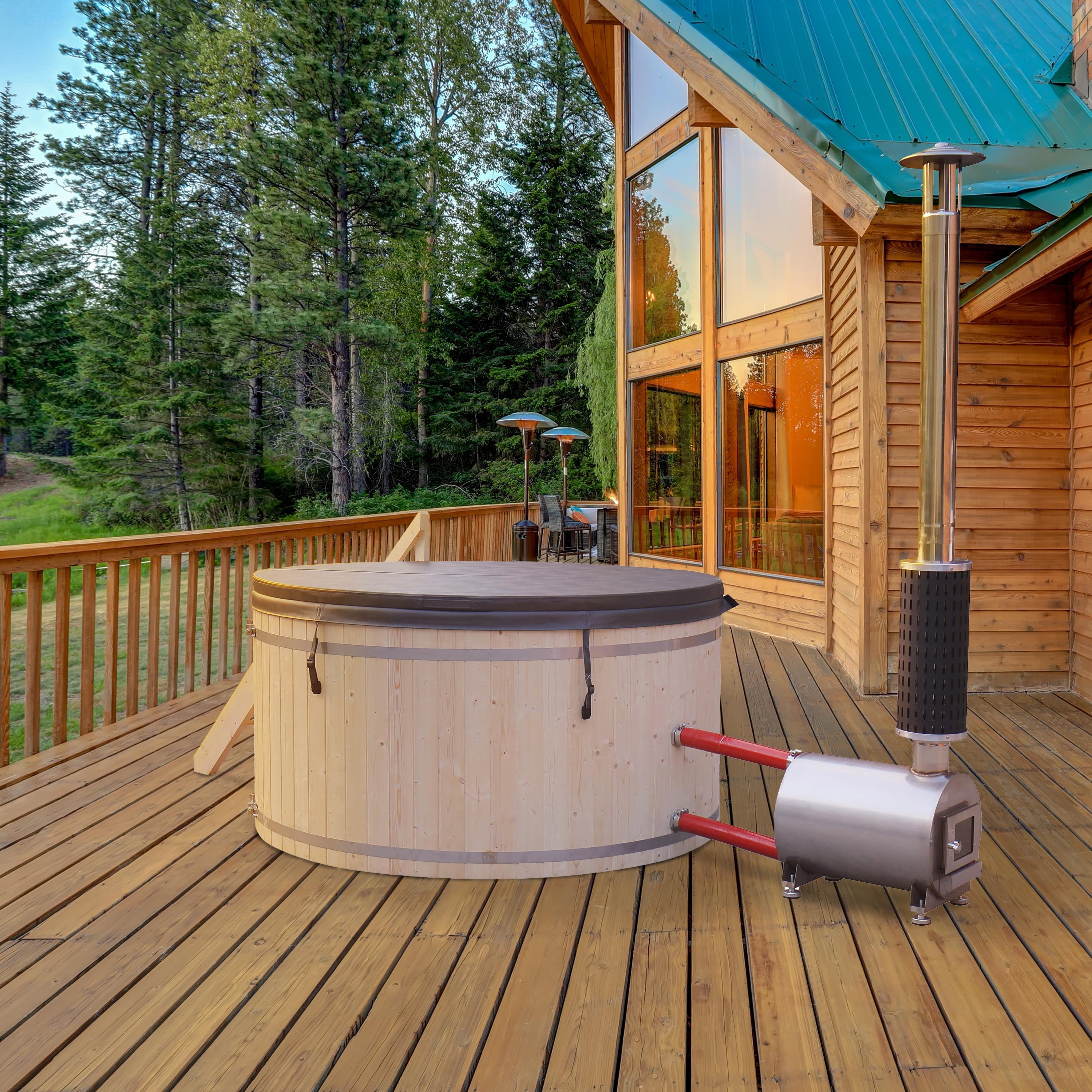 Wooden hot tub on a wooden deck with a cabin in the background.